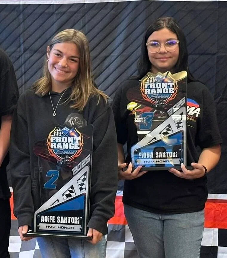 Aoife “Black Widow” (Left),and Fiona “Red Rock” Sartori (Right) holding up their trophies earned from the Front Range Series - Click to read more!